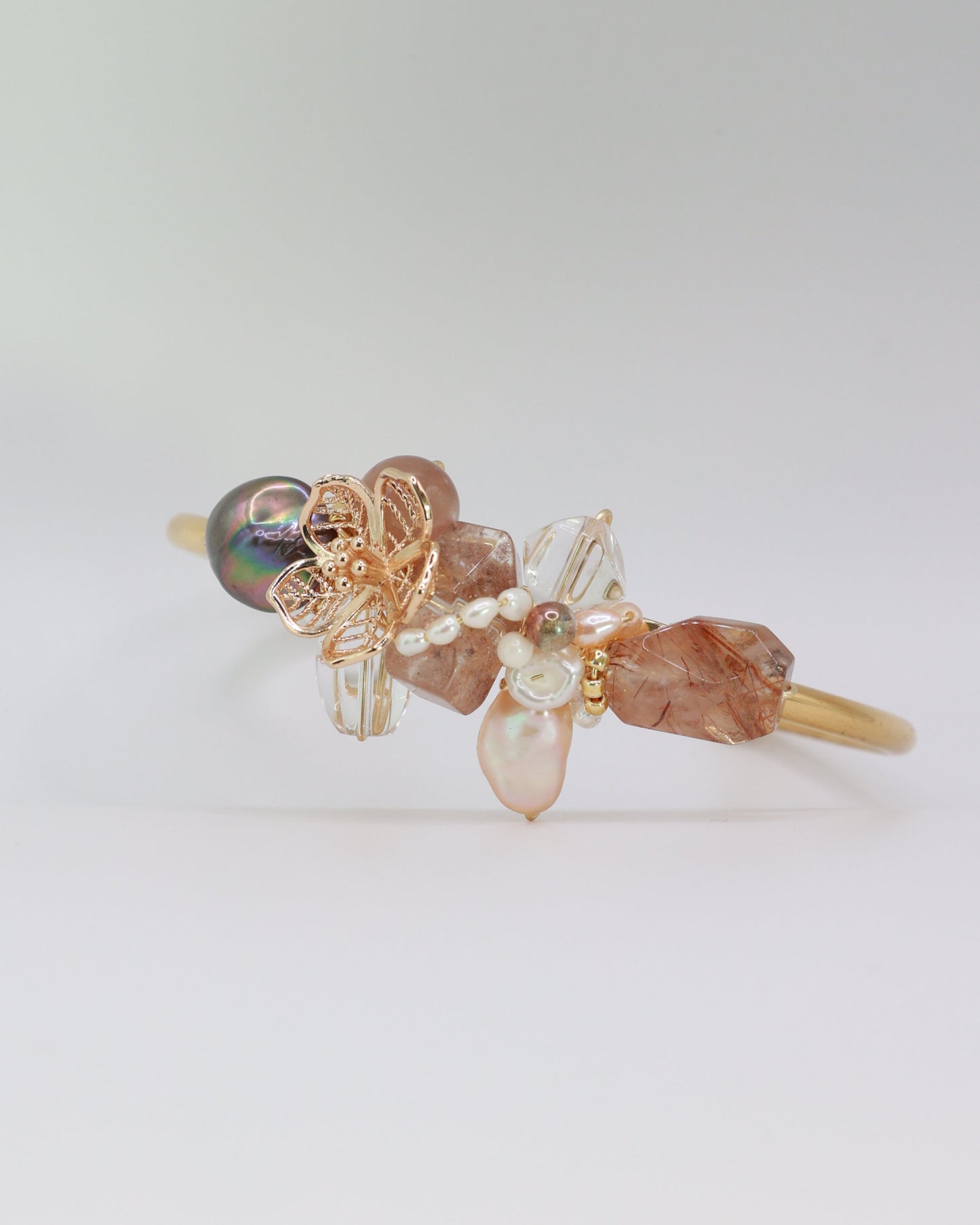 cuff bangle with beads and gold elements